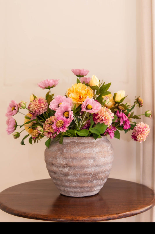 The Hermitage, a faux floral arrangement of ruffled blush pink Scabiosas, dried-touch yellow Peonies,  pink Country Poppies and  Pom Pom Dahlias of nude and fuchsia