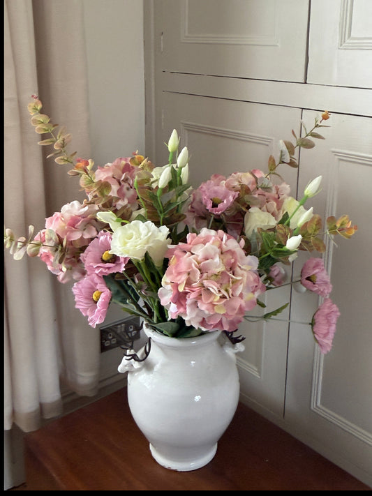 The Dartmouth, Faux floral arrangement of Pink Mop head Hydrangeas,brown green Eucalyptus, pink country Poppies and ivory Royal Lisianthus in cream vase.