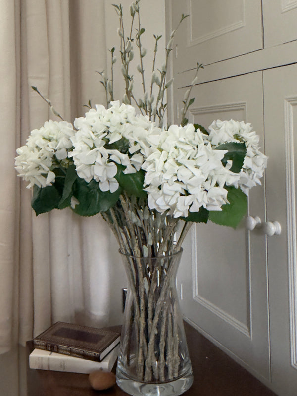 Faux floral arrangement of Real-touch ivory garden Hydrangeas, and seven Pussy Willow sprays. 